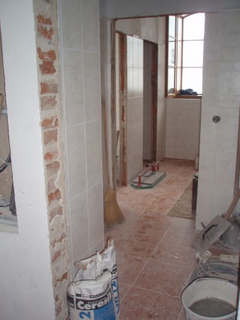 dokončení obložení sociálního zařízení, 2009